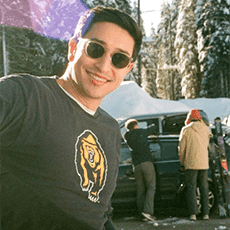 Photo of person next to skis and snow