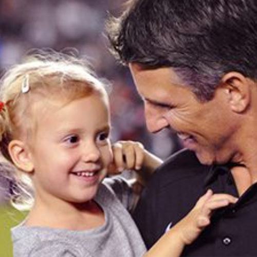 Photo of person holding a toddler