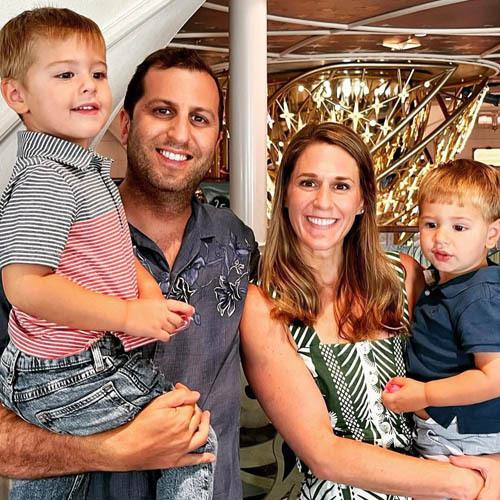 Photo of a man, woman, and two children