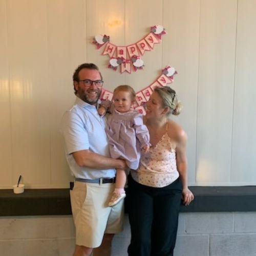 Photo of two people and a child