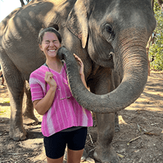 Photo of a person with an elephant