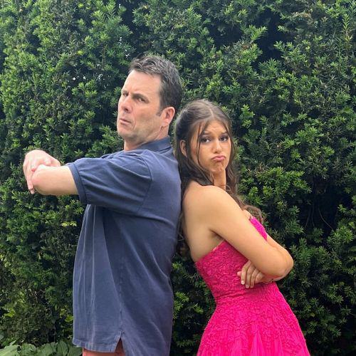 Photo of a person and teen back to back